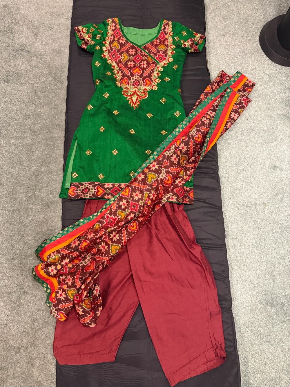 Women’s three piece Kurta top and bottom set in green and rust brown